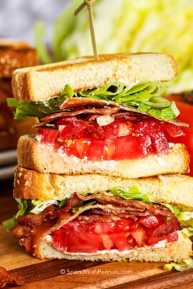 2 halves of a blt sandwich stacked