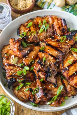 Grilled Teriyaki Chicken plated with sesame seeds