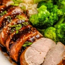 Teriyaki Pork Tenderloin on a plate with broccoli and rice