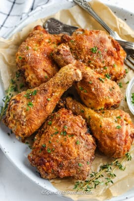 air fryer fried chicken on a plate topped with parsley