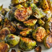 balsamic brussels sprouts piled on a plate