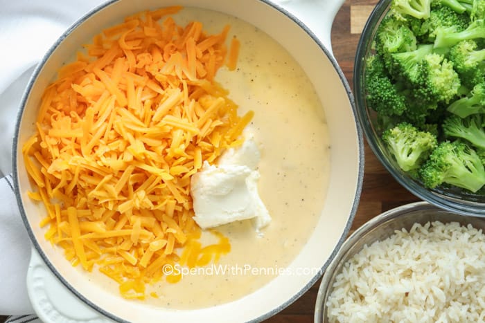Creamy cheese sauce ingredients in a sauce pan.