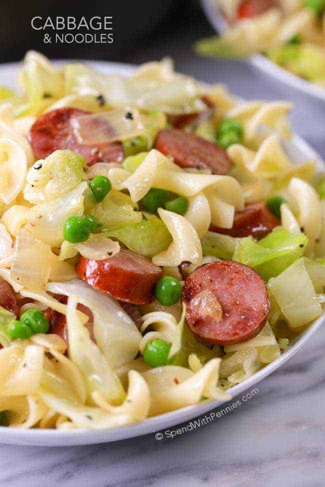 Cabbage and Noodles in a bowl with peas and sausage
