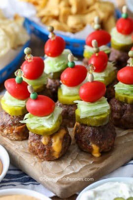 Cheeseburger stuffed meatballs on parchment paper