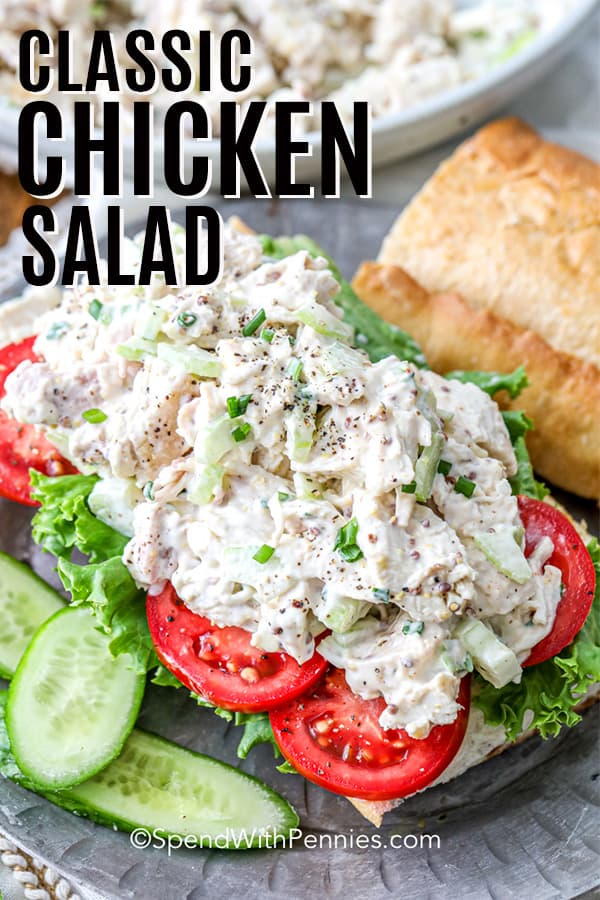 Classic Chicken Salad served over greens and tomatoes with a title