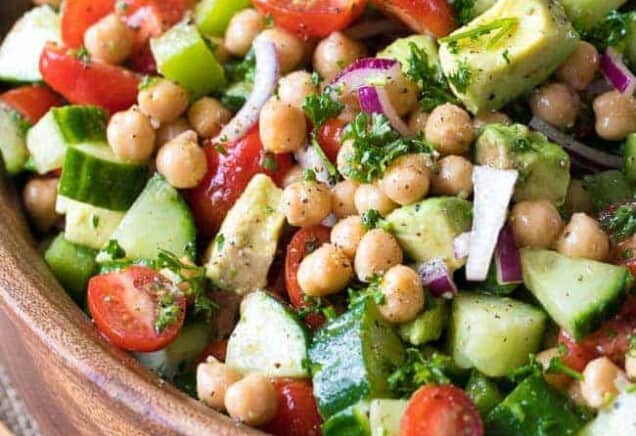 Wooden bowl full of Chickpea Salad