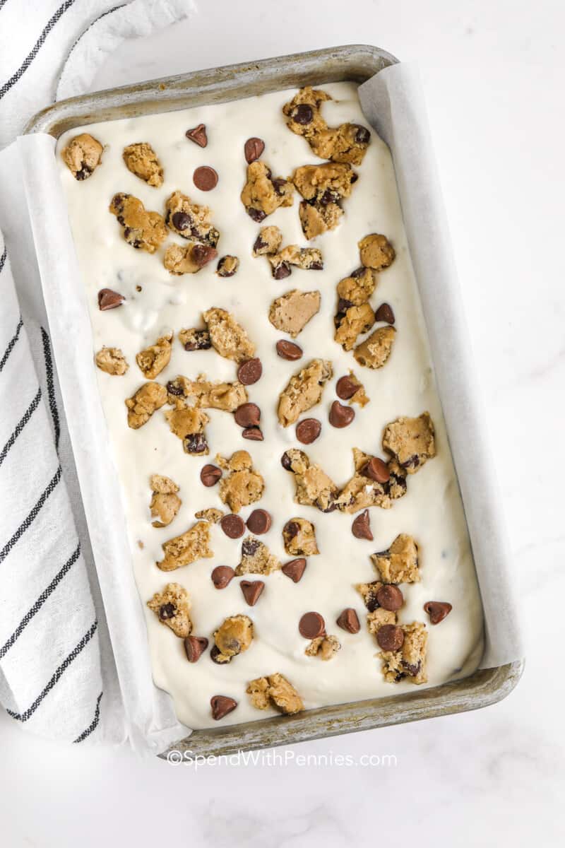 a loaf pan with cookie dough ice cream inside