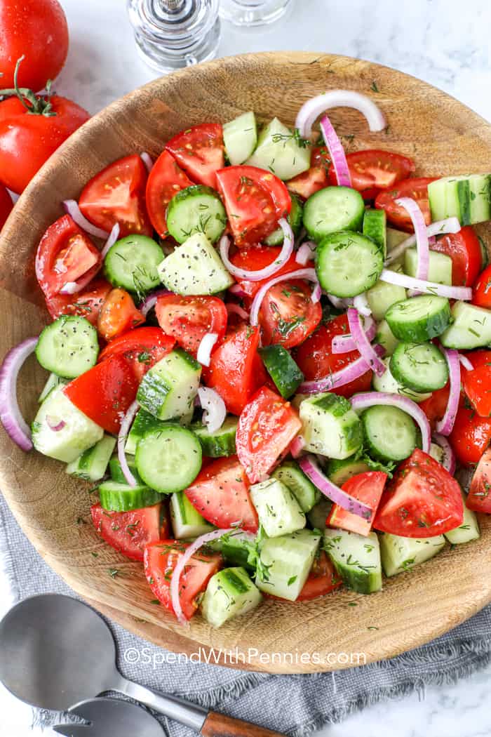 Overhead picture of Cucumber Tomato Salad in a wooden bowl