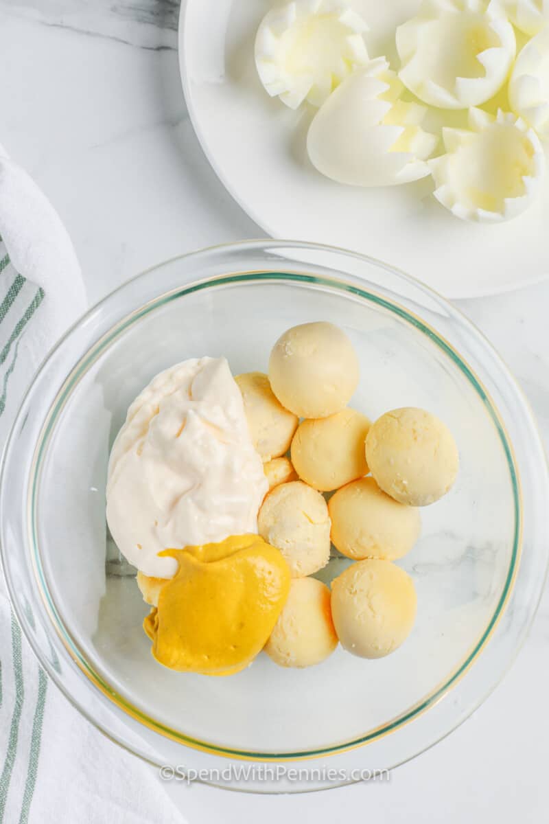 ingredients in a bowl to make Deviled Egg Chicks filling