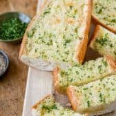 Sliced Homemade Garlic Bread on a cutting board