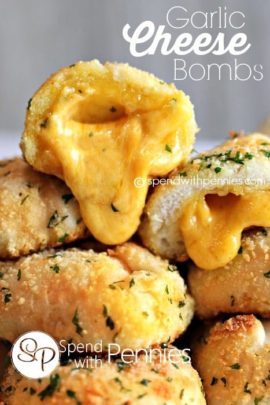 close up Garlic Cheese Bombs with cheese oozing out