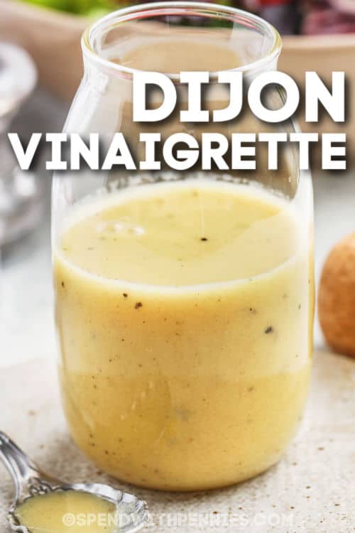 Easy Dijon Vinaigrette in a jar with writing