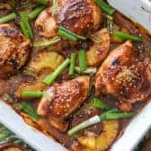 Overhead picture of Pineapple chicken teriyaki in a white baking dish