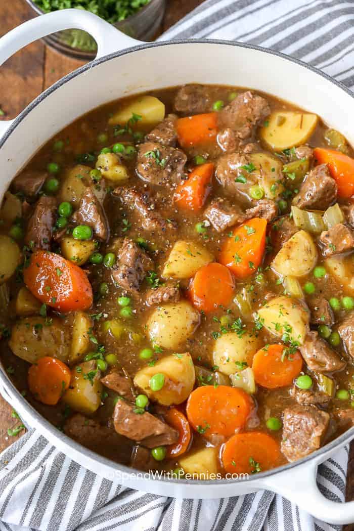 Overhead shot of Beef Stew in a big white pot