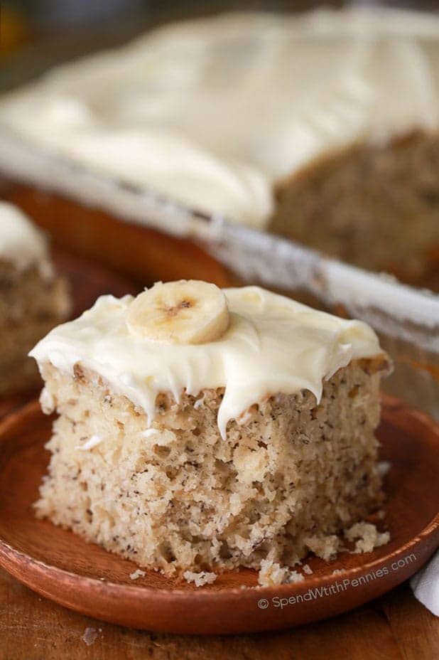 Single serving of Banana Cake on a wooden plate
